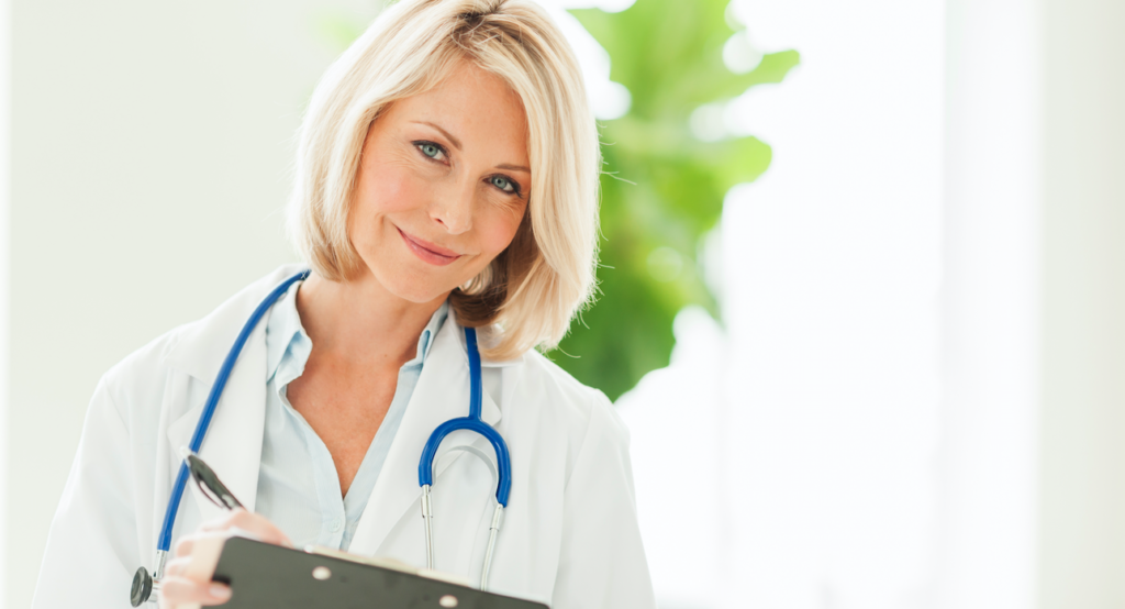 doctor-physician-woman-standing-clipboard-Eskridge-Associates